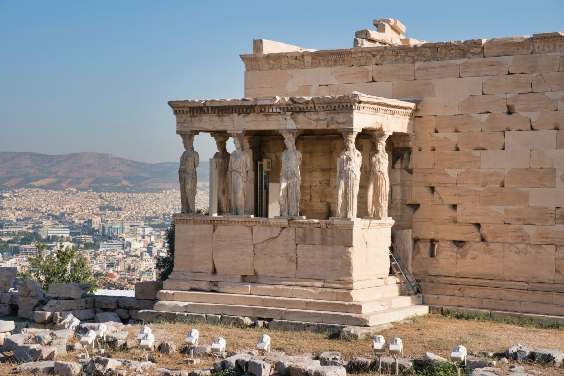 A scenic view of the Caryatid porch of the Erechtheion in Athens, Greece